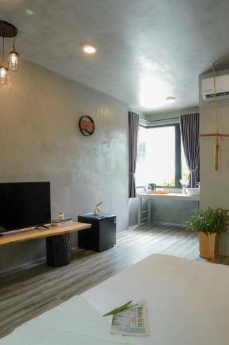 TV a/nebo společenská místnost v ubytování Babylon Mini Resort