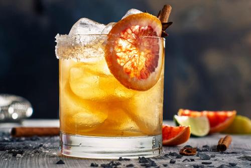 a glass of sangria with a slice of blood orange at Courtyard by Marriott Pune Chakan in Chakan