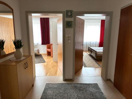 a hallway with a living room and a bedroom at Haus Hermine in Tarrenz