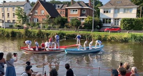 a group of people on boats in the water at Gîte Le Sambre in Thuin