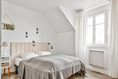 Postel nebo postele na pokoji v ubytování Près du port du Guilvinec, maison de ville pour 5