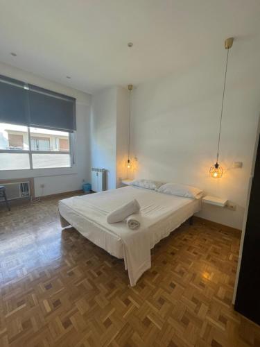 Postel nebo postele na pokoji v ubytování Hermosilla rooms