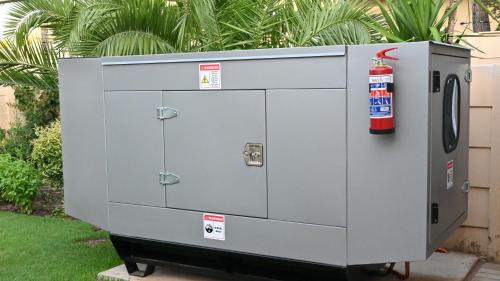 a large metal box with a fire extinguisher on it at LUXURY EN-SUITE ROOM WITH LOUNGE @ 4 STAR GUEST HOUSE in Middelburg