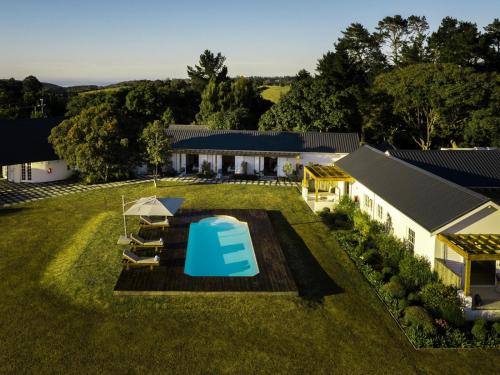 an overhead view of a backyard with a pool at Crags Country Lodge in The Crags