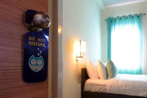 Postel nebo postele na pokoji v ubytování Hotel West End