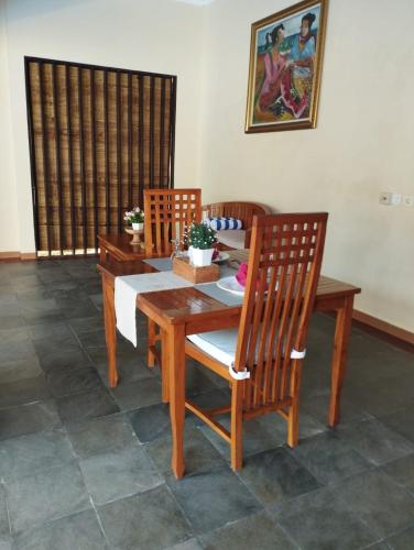 Un lugar para sentarse en Kartika Dahayu Private Pool Villas