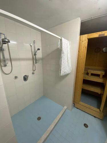 a bathroom with a shower and a sink and a shower at Magi - Villa Amare in Ponza