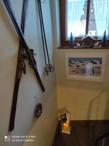 a room with some weapons on the wall at Haus Mühlenheim in Schwendau