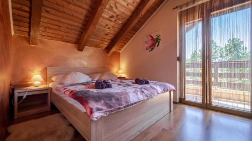 Ένα ή περισσότερα κρεβάτια σε δωμάτιο στο Guest house Donna