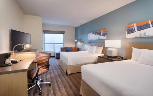 Postel nebo postele na pokoji v ubytování Hyatt House Provo/Pleasant Grove