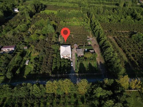 an aerial view of a house with a red marker at Ani's Green House in Anaklia