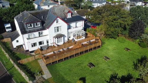 an aerial view of a house with a large yard at St Merryn in Carbis Bay