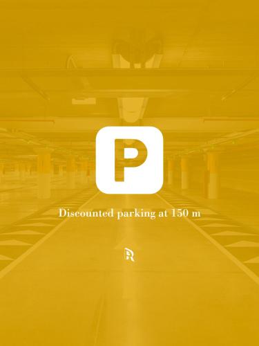 a poster of a parking lot with the p symbol at Prestige Rooms Chiaia in Naples