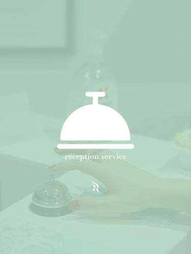 a light on top of a glass table at Prestige Rooms Chiaia in Naples
