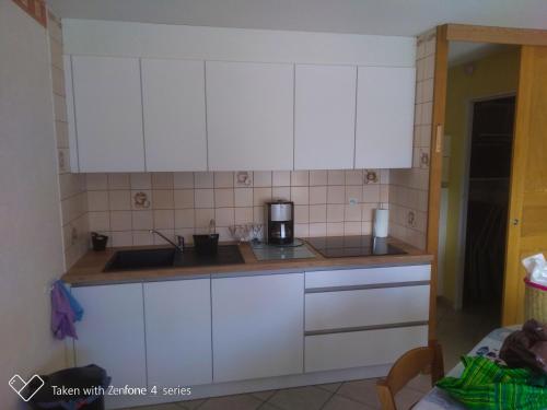 Kuchyň nebo kuchyňský kout v ubytování Appartement cosy avec vue sur la mer à Camiers - 46 m²