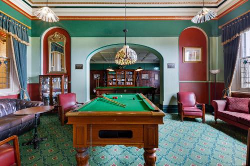 a billiard room with a pool table in it at Carrington Hotel in Katoomba