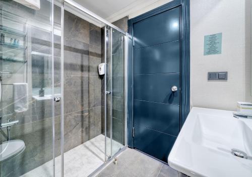 Koupelna v ubytování Numa Port Hotel
