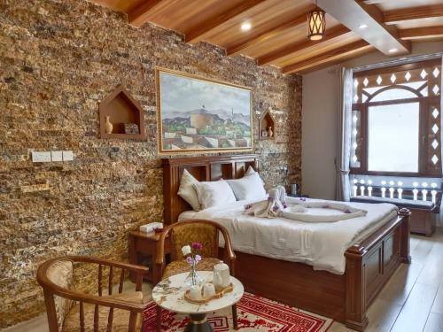 Postel nebo postele na pokoji v ubytování Durrat Nizwa Inn