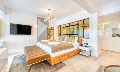 Postel nebo postele na pokoji v ubytování Numa Port Hotel