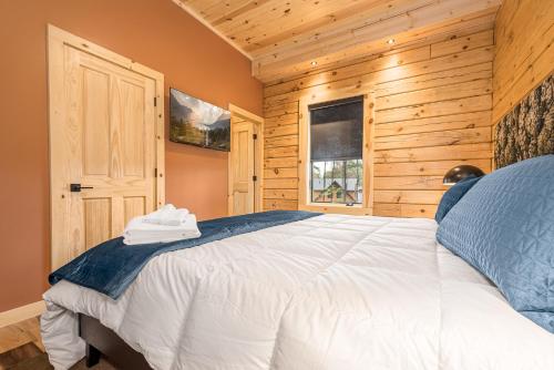 Katil atau katil-katil dalam bilik di Black Diamond Lodge