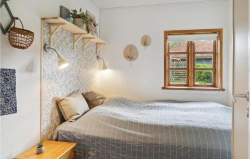 Postel nebo postele na pokoji v ubytování 3 Bedroom Stunning Home In Vggerlse