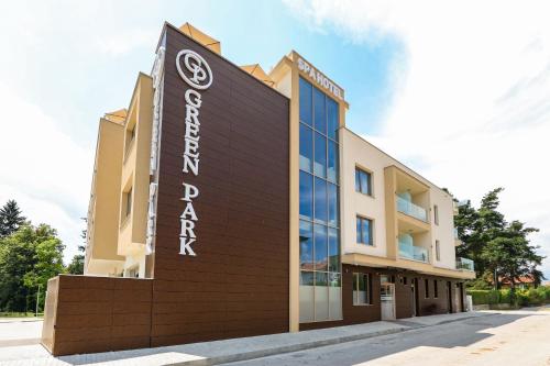 a rendering of the front of a building at Hotel Green Park Service Perfected in Garmen