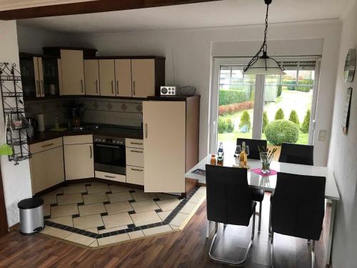 Kuchyň nebo kuchyňský kout v ubytování Bungalow 30 "Medita"