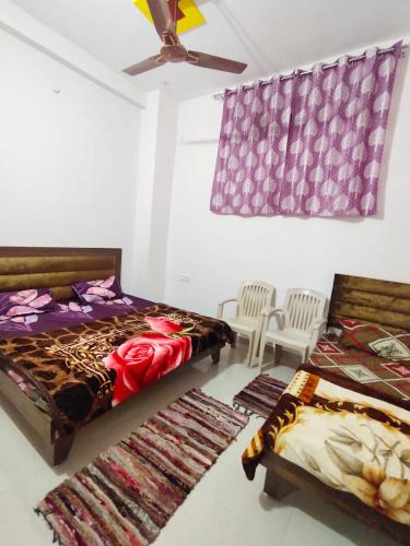 Posezení v ubytování Deviksha Home Stay