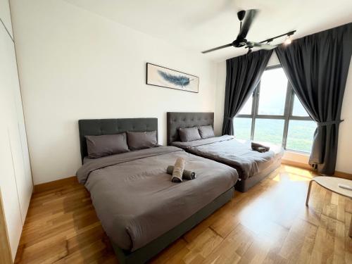 Postel nebo postele na pokoji v ubytování Teega Suites #3101 Puteri Harbour Iskandar Puteri