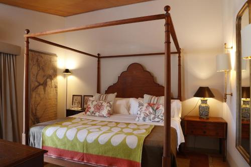 En eller flere senge i et værelse på Casas Do Coro