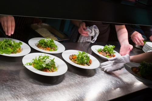 a group of plates of food on a counter at Landgasthaus Gieseke-Asshorn in Bohmte