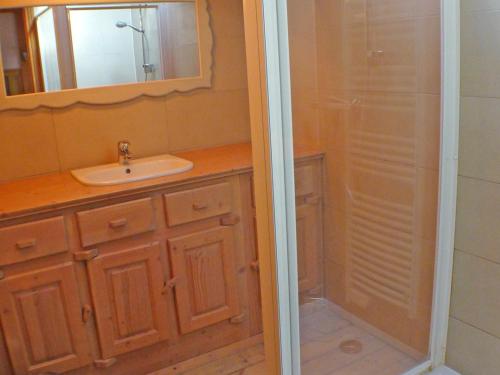 a bathroom with a sink and a shower at Chalet Samoëns, 8 pièces, 14 personnes - FR-1-629-1 in Samoëns