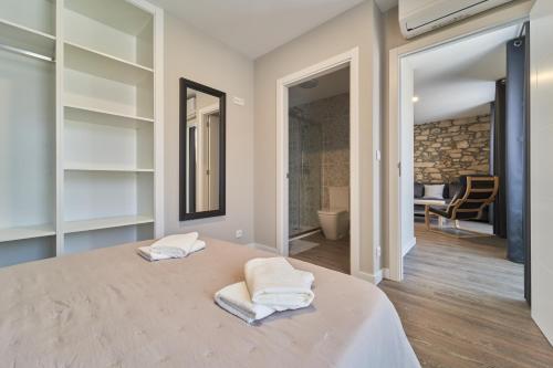 Postel nebo postele na pokoji v ubytování Apartamentos Carballal