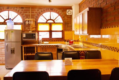 Kuchyň nebo kuchyňský kout v ubytování SIERRA VERDE-casa vacacional