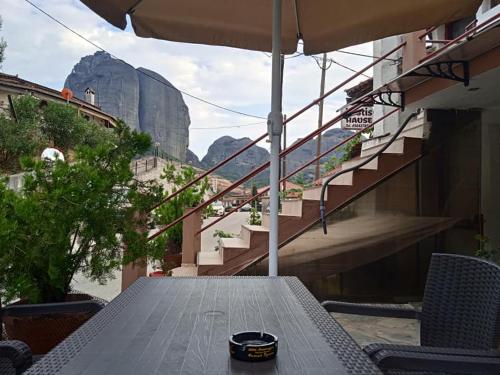 a picnic table with a view of the mountain at Kostis Hause in Kastrákion