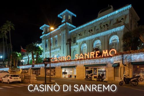 a building with a sign that reads casico d santario at Principato di Baragallo - Free Private Parking in Sanremo