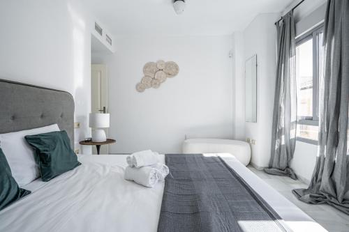 Postel nebo postele na pokoji v ubytování Stay U-nique Apartment Plaza del Patrocinio