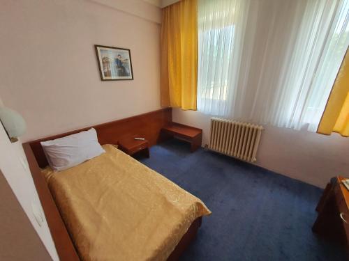 Cama o camas de una habitación en Hotel Norcev