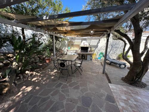 Patio nebo venkovní prostory v ubytování Villetta Calasetta intera casa vacanze
