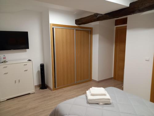 Кровать или кровати в номере Hotel Rural Virgen del Carmen