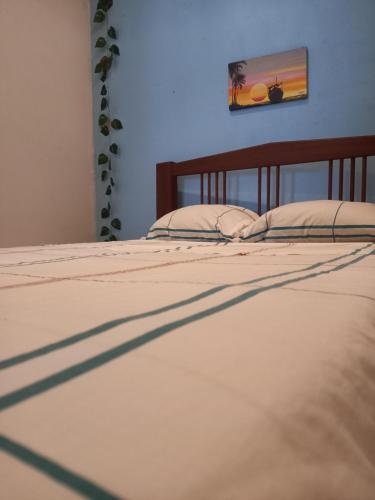 Postel nebo postele na pokoji v ubytování Tranquilandia Hostel