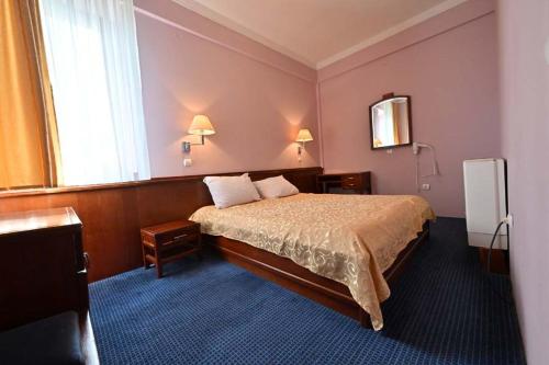 Cama o camas de una habitación en Hotel Norcev