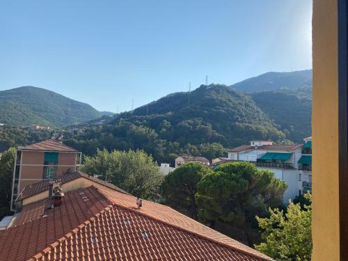 a view of a town with mountains in the background at DA ARMÀ in La Spezia