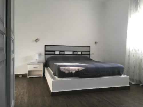 Ліжко або ліжка в номері Apartamento tranquilo con magnífica terraza