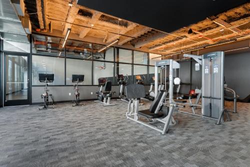 a gym with several treadmills and cardio equipment at Experience Downtown Chicago at Millennium - Luxury Apartments in The Loop in Chicago