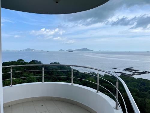 a view of the ocean from the balcony of a cruise ship at 14F Luxury Resort Lifestyle Ocean Views in Playa Bonita Village