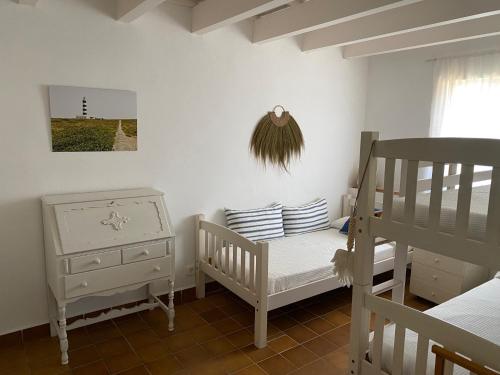 Ένα ή περισσότερα κρεβάτια σε δωμάτιο στο Villa SES TANQUES 17