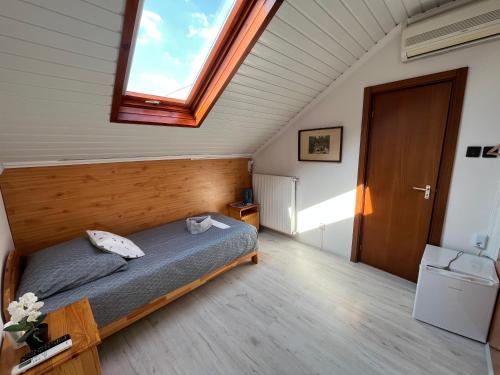 Postel nebo postele na pokoji v ubytování Tang house 唐舍