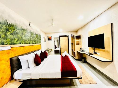 Hotel Lake View Airport zoneにあるテレビまたはエンターテインメントセンター