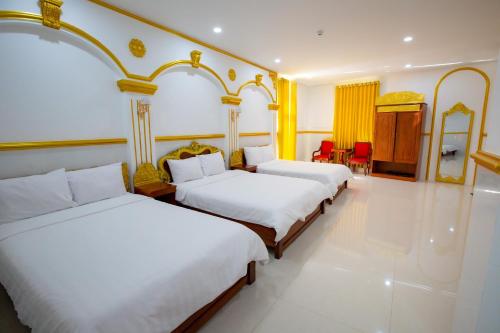Cama o camas de una habitación en KING VILLA QUẢNG NGÃI